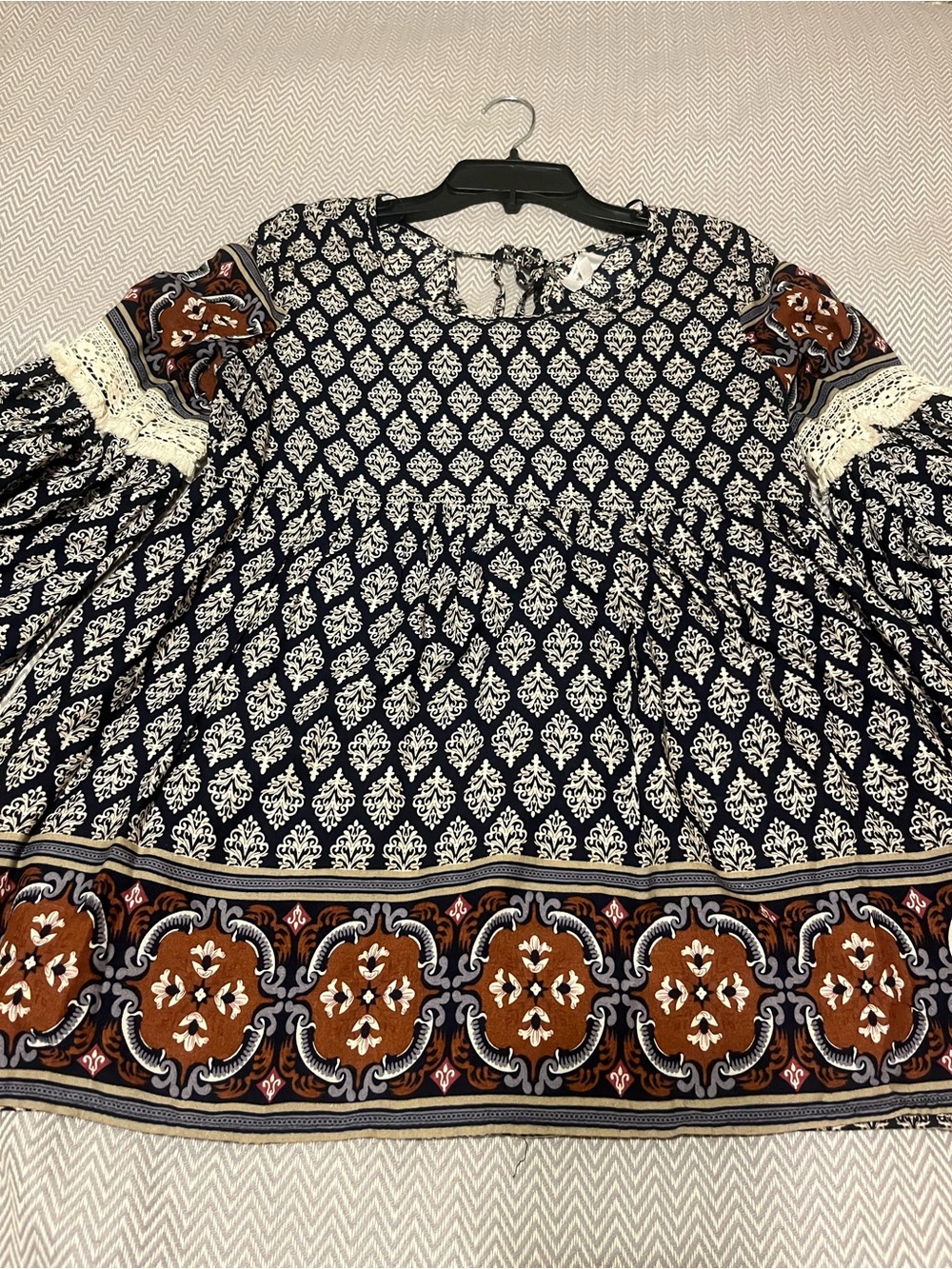 Entro Boho Black/Brown Printed Peasant Top w/ Bell Sleeves and Crochet Details.